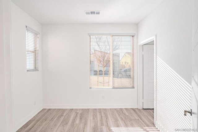 empty room featuring light hardwood / wood-style floors