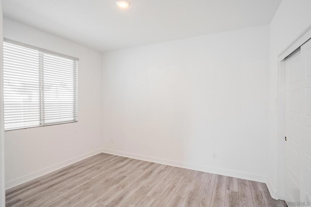 empty room featuring light hardwood / wood-style floors