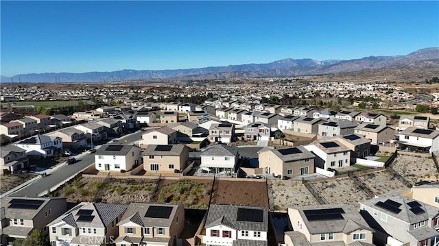 birds eye view of property featuring a residential view and a mountain view