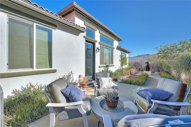 view of patio featuring fence