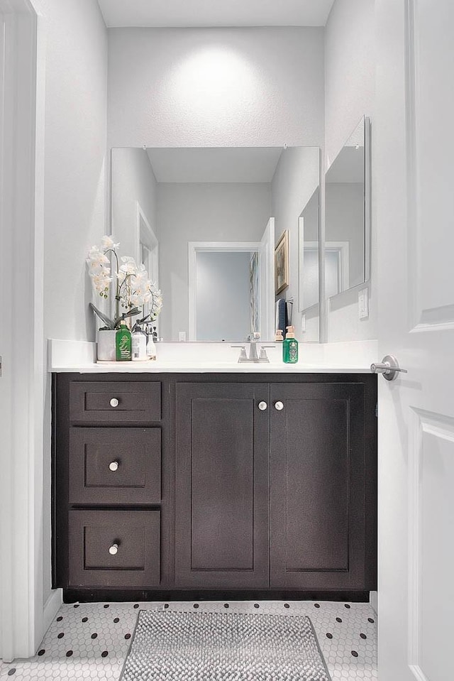 bathroom featuring tile patterned floors and vanity