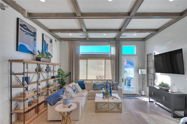 living room with coffered ceiling, hardwood / wood-style floors, and beam ceiling