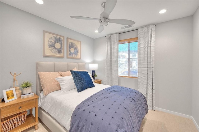 carpeted bedroom with ceiling fan