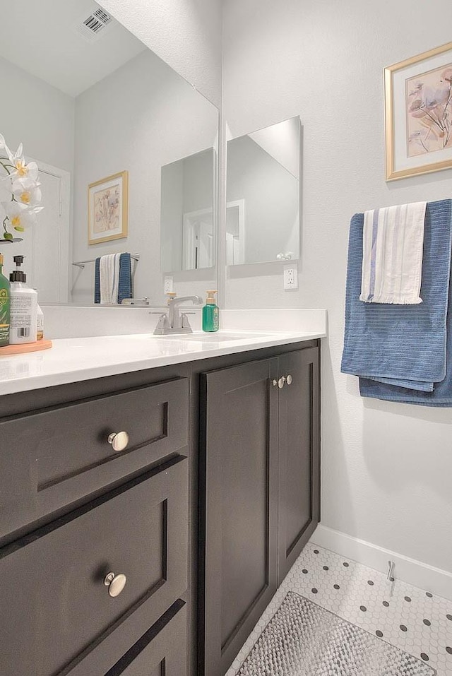 bathroom featuring vanity and tile patterned floors