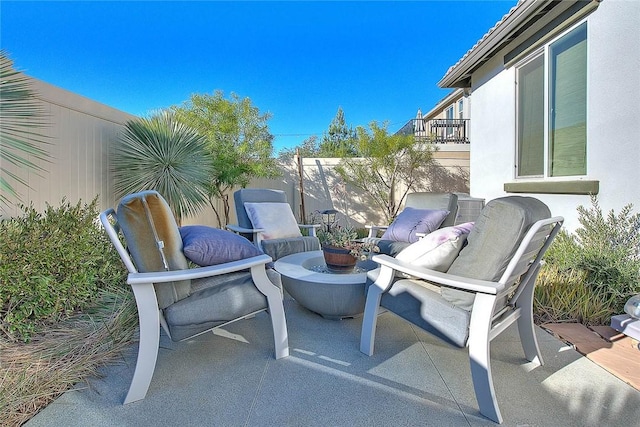 view of patio / terrace with fence