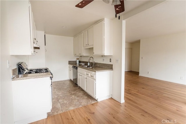 kitchen with ceiling fan, dishwasher, sink, and white cabinetry