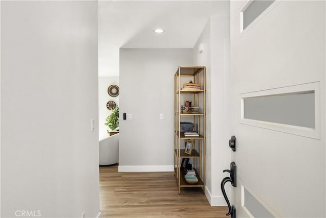 hallway featuring light hardwood / wood-style floors