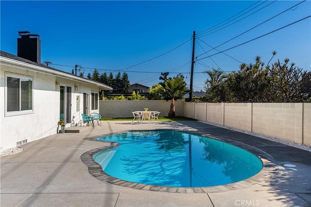 view of pool with a patio area