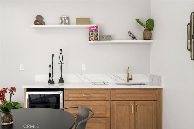 bar with beverage cooler and sink