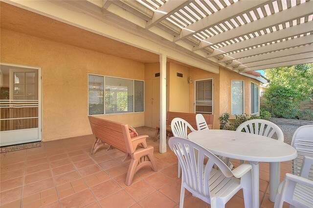 view of patio featuring a pergola