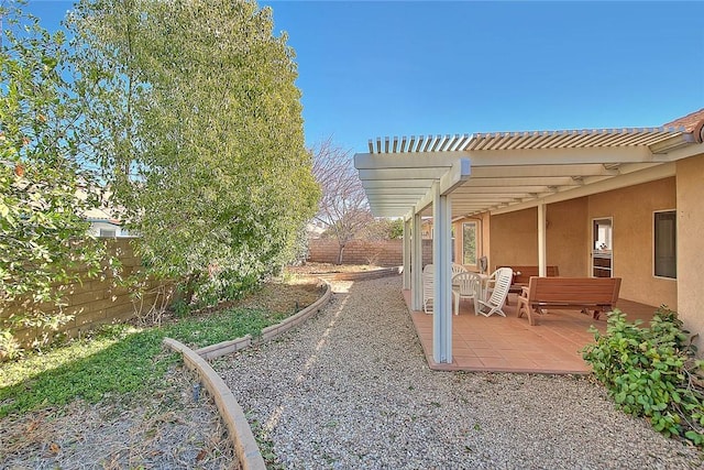 view of yard with a patio and a pergola