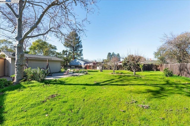 view of yard with a patio area