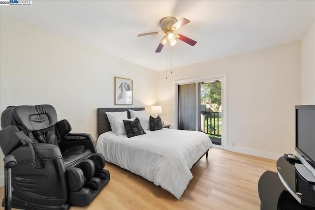 bedroom with ceiling fan, light hardwood / wood-style flooring, and access to outside