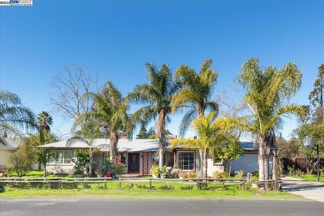 ranch-style home with a garage