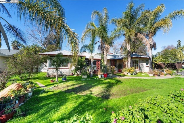 view of front of house with a front yard