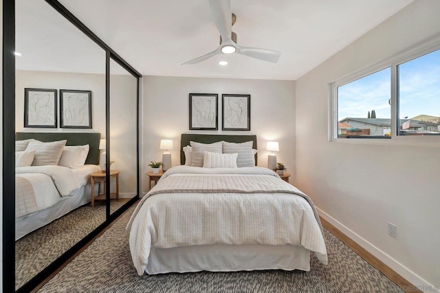 bedroom featuring ceiling fan and hardwood / wood-style floors