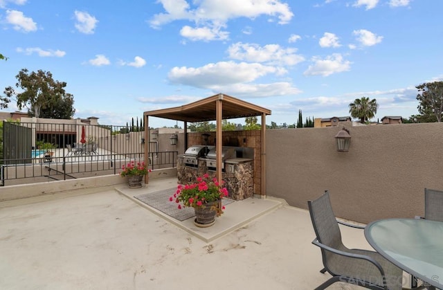 view of patio featuring a gazebo and grilling area