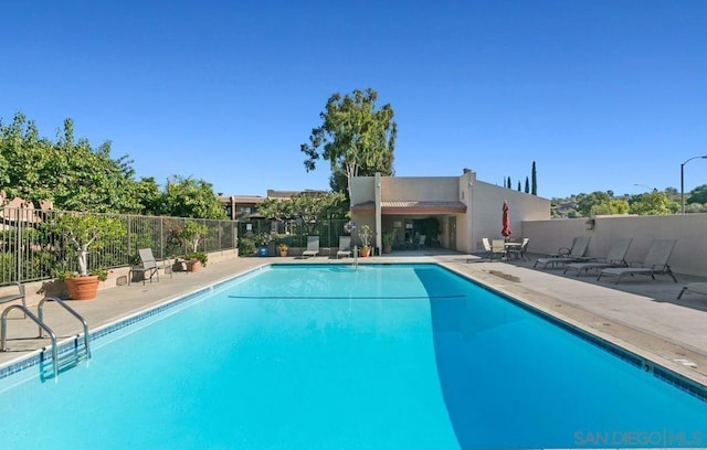 view of pool featuring a patio