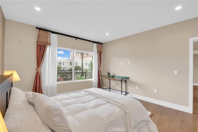 bedroom featuring light hardwood / wood-style floors