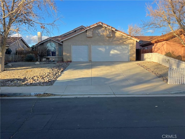 view of front of home with a garage