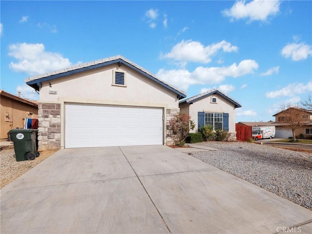 ranch-style home featuring a garage