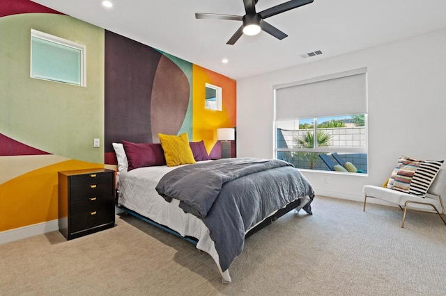 bedroom with ceiling fan and carpet floors