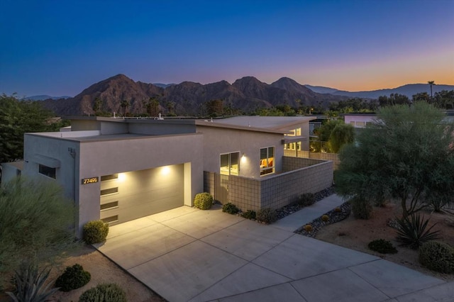 view of front of house featuring a mountain view