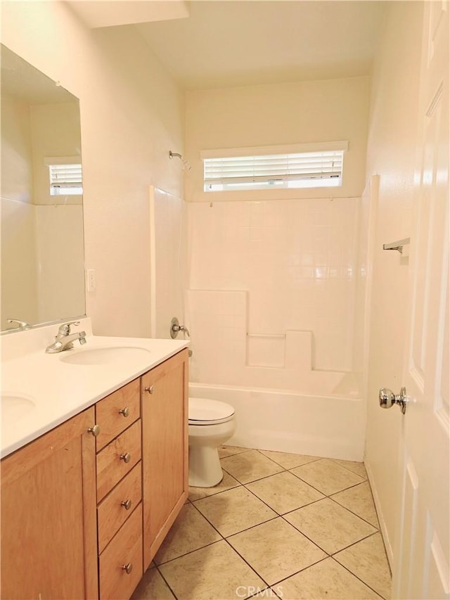 full bathroom featuring toilet, bathing tub / shower combination, tile patterned flooring, and a wealth of natural light