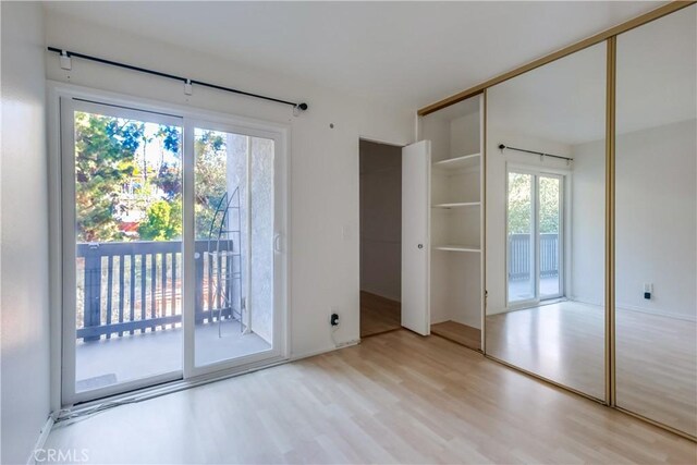 entryway with light hardwood / wood-style flooring