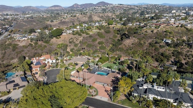 5455 Toyon Rd, San Diego, CA 92115 - aerial overview of property's location featuring a mountainous background and nearby suburban area