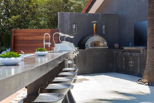5455 Toyon Rd, San Diego, CA 92115 - view of patio / terrace with an outdoor kitchen