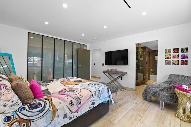 5455 Toyon Rd, San Diego, CA 92115 - bedroom with light wood finished floors, a closet, recessed lighting, and ensuite bath