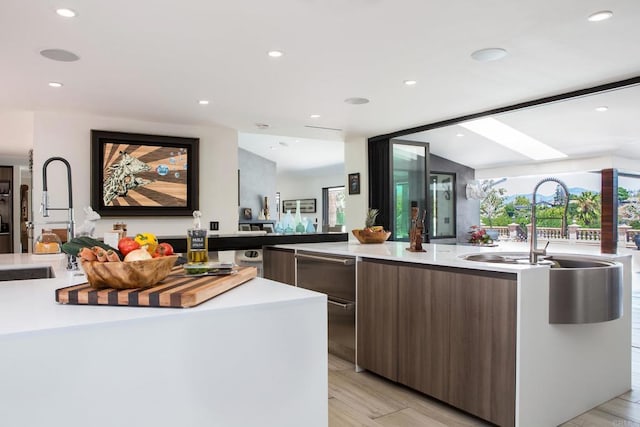 5455 Toyon Rd, San Diego, CA 92115 - kitchen with modern cabinets, a kitchen island with sink, light countertops, and recessed lighting