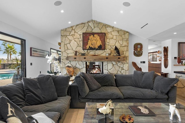 5455 Toyon Rd, San Diego, CA 92115 - living room with wood finished floors, lofted ceiling, recessed lighting, and a stone fireplace