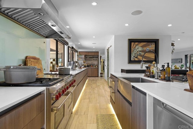 5455 Toyon Rd, San Diego, CA 92115 - kitchen featuring wall chimney exhaust hood, stainless steel appliances, modern cabinets, light countertops, and recessed lighting