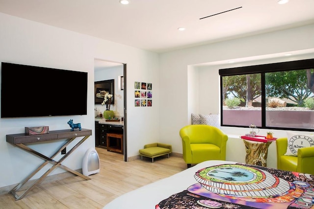 5455 Toyon Rd, San Diego, CA 92115 - living area featuring light wood finished floors and recessed lighting