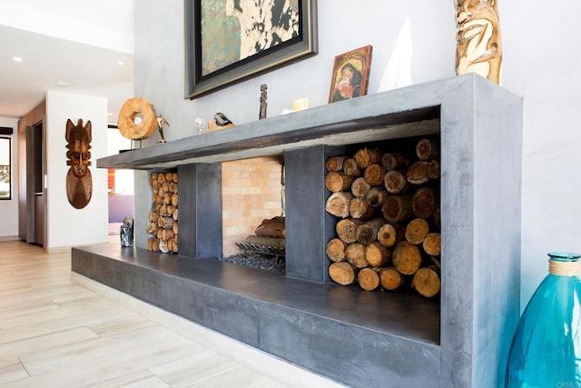 5455 Toyon Rd, San Diego, CA 92115 - detailed view of a fireplace and wood finished floors
