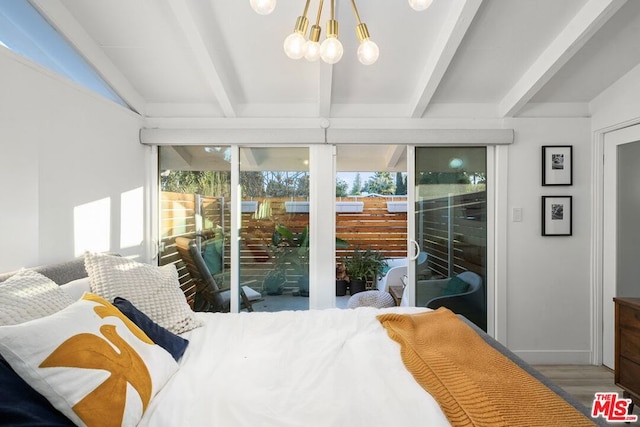 bedroom with access to exterior, beam ceiling, hardwood / wood-style floors, and multiple windows