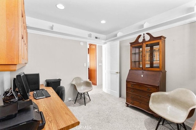 office area with light colored carpet and ornamental molding