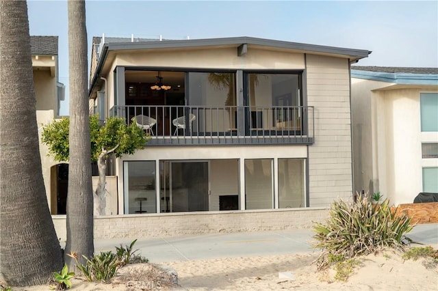 1510 W Oceanfront, Newport Beach, CA 92663 - rear view of property with a balcony