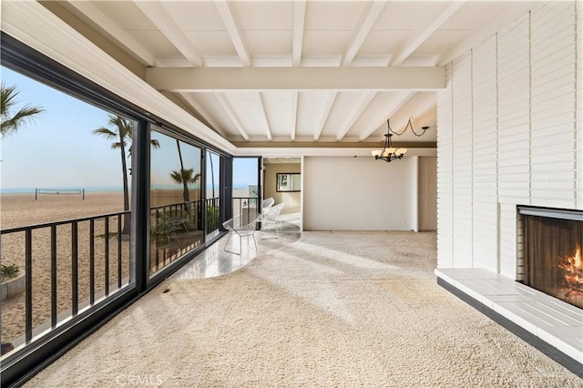 1510 W Oceanfront, Newport Beach, CA 92663 - unfurnished sunroom with an inviting chandelier and beam ceiling
