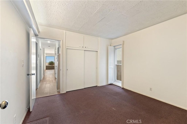 1510 W Oceanfront, Newport Beach, CA 92663 - unfurnished bedroom with dark carpet and a closet