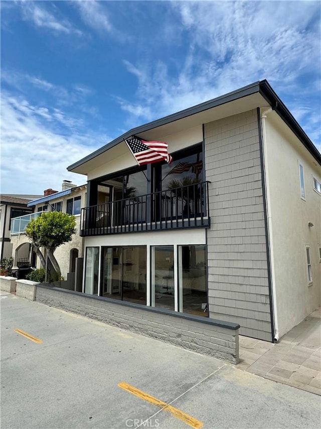1510 W Oceanfront, Newport Beach, CA 92663 - view of property featuring uncovered parking