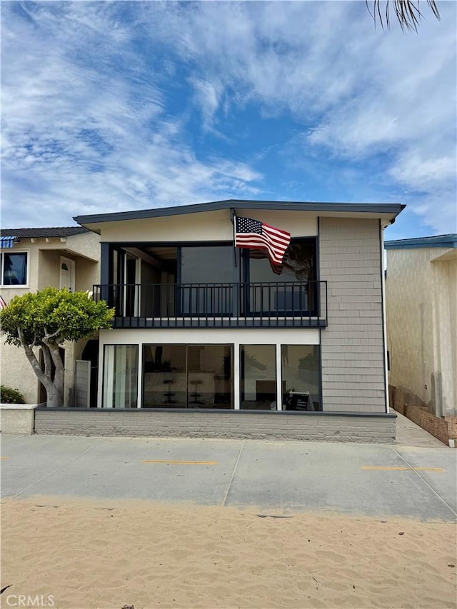 1510 W Oceanfront, Newport Beach, CA 92663 - view of building exterior featuring uncovered parking
