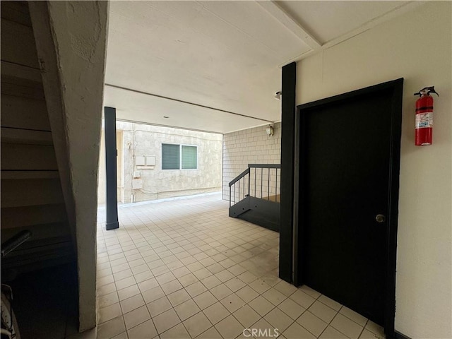 1510 W Oceanfront, Newport Beach, CA 92663 - corridor featuring light tile patterned flooring