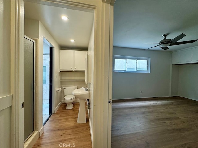 1510 W Oceanfront, Newport Beach, CA 92663 - full bath with a shower stall, wood finished floors, a ceiling fan, and recessed lighting