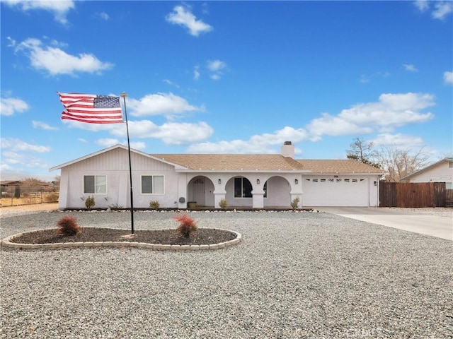 ranch-style home with a garage