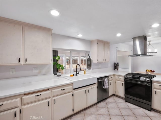 kitchen with light tile patterned floors, island exhaust hood, dishwasher, black range with gas cooktop, and sink