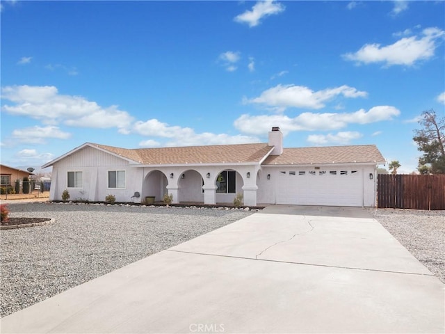 single story home featuring a garage