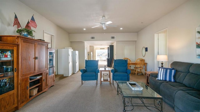 living room featuring ceiling fan